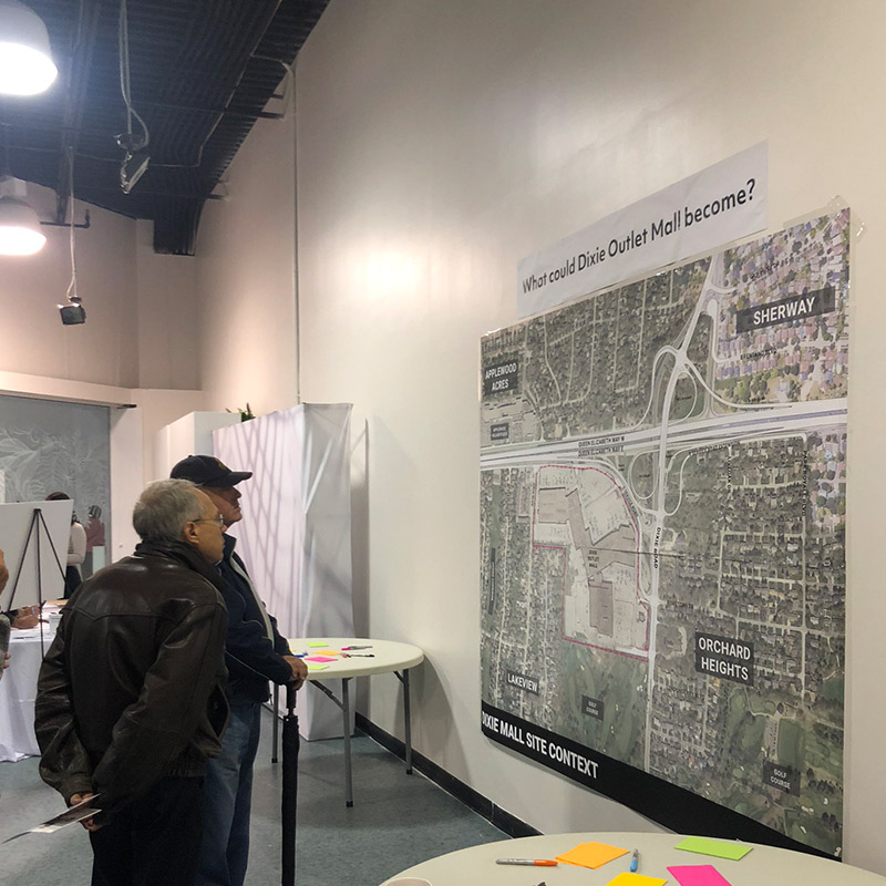 community members viewing site context map